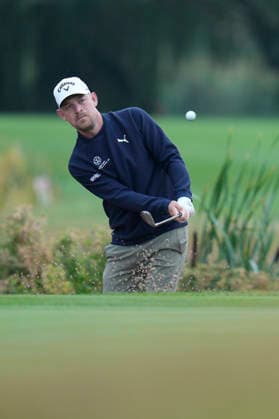 SUTTON COLDFIELD, ENGLAND - AUG 28: Jeff Winther (DEN) chips to the 8th green during the completion of the delayed Round 1 at the 2026 Husqvarna British Masters at The Belfry, Sutton Coalfield on August 28, 2026 in Warwickshire, England The 2026 Husqvarna British Masters