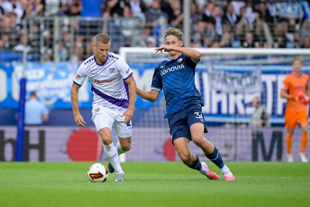 Tony Lesueur (VfL Osnabrueck) und Mats Pannewig (VfL Bochum) im Kampf um den Ball waehrend des spiels der 2. Bundesliga zwischen VfL Bochum und VfL Osnabrueck, Vonovia Ruhrstadion am 28. August 2026 in Bochum, Deutschland. (Foto von Max Maiwald DeFodi Images) +++ Tony Lesueur (VfL Osnabrueck) und Mats Pannewig (VfL Bochum) battle for the ball during the 2nd Bundesliga match between VfL Bochum and VfL Osnabrueck at Vonovia Ruhrstadion on August 28, 2026 in Bochum, Germany. (Photo by Max Maiwald DeFodi Images) DFB DFL REGULATIONS PROHIBIT ANY USE OF PHOTOGRAPHS AS IMAGE SEQUENCES AND OR QUASI-VIDEO. (Photo by Max Maiwald DeFodi Images) - *** Tony Lesueur of VfL Osnabrück and Mats Pannewig of VfL Bochum battle for the ball during the 2. Bundesliga match between VfL Bochum and VfL Osnabrück at the Vonovia Ruhrstadion on August 28, 2026, in Bochum, Germany. Photo by Max Maiwald, DeFodi Images. Tony Lesueur of VfL Osnabrück and Mats Pannewig of VfL Bochum battle for the ball during the 2. Bundesliga match between VfL Bochum and VfL Osnabrück at Vonovia Ruhrstadion on August 28, 2026 in Bochum, Germany. Photo by Max Maiwald, DeFodi Images. DFB and DFL regulations prohibit any use of photographs as image sequences and or quasi-video. Photo by Max Maiwald, DeFodi Images.