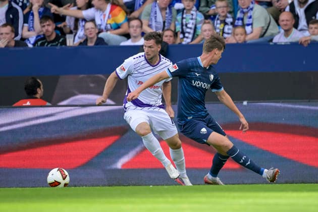Luca Raimund (VfL Osnabrueck) und Leon Sawas (VfL Bochum) im Kampf um den Ball waehrend des spiels der 2. Bundesliga zwischen VfL Bochum und VfL Osnabrueck, Vonovia Ruhrstadion am 28. August 2026 in Bochum, Deutschland. (Foto von Max Maiwald DeFodi Images) +++ Luca Raimund (VfL Osnabrueck) und Leon Sawas (VfL Bochum) battle for the ball during the 2nd Bundesliga match between VfL Bochum and VfL Osnabrueck at Vonovia Ruhrstadion on August 28, 2026 in Bochum, Germany. (Photo by Max Maiwald DeFodi Images) DFB DFL REGULATIONS PROHIBIT ANY USE OF PHOTOGRAPHS AS IMAGE SEQUENCES AND OR QUASI-VIDEO. (Photo by Max Maiwald DeFodi Images) - *** Luca Raimund of VfL Osnabrück and Leon Sawas of VfL Bochum battle for the ball during the 2. Bundesliga match between VfL Bochum and VfL Osnabrück at the Vonovia Ruhrstadion on August 28, 2026, in Bochum, Germany. Photo by Max Maiwald, DeFodi Images. Luca Raimund of VfL Osnabrück and Leon Sawas of VfL Bochum battle for the ball during the 2. Bundesliga match between VfL Bochum and VfL Osnabrück at Vonovia Ruhrstadion on August 28, 2026 in Bochum, Germany. Photo by Max Maiwald, DeFodi Images. DFB and DFL regulations prohibit any use of photographs as image sequences and or quasi-video. Photo by Max Maiwald, DeFodi Images.