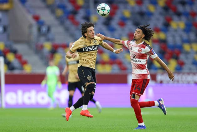 David Preu of VfB Stuttgart II and Anas Slimani of Fortuna Düsseldorf battle for the ball during the 3. Liga match between Fortuna Düsseldorf and VfB Stuttgart II at the Merkur Spiel Arena on August 28, 2026, in Düsseldorf, Germany. Photo by Oliver Kaelke, DeFodi Images. David Preu of VfB Stuttgart II and Anas Slimani of Fortuna Düsseldorf battle for the ball during the 3. Liga match between Fortuna Düsseldorf and VfB Stuttgart II at the Merkur Spiel Arena on August 28, 2026 in Düsseldorf, Germany. Photo by Oliver Kaelke, DeFodi Images. DFB and DFL regulations prohibit any use of photographs as image sequences and or quasi-video. Photo by Oliver Kaelke, DeFodi Images.