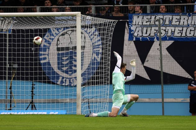 Chemnitz goalkeeper David Richter throws his arms up in despair, but the ball finds the back of the net for a 0–1 score, Chemnitz FC vs. Carl Zeiss Jena, Matchday 7, 2026–27 Northeast Regional League, Eins Stadium on Gellertstrasse, Chemnitz, Saxony, Germany, August 28, 2026, high-risk match, 1st half