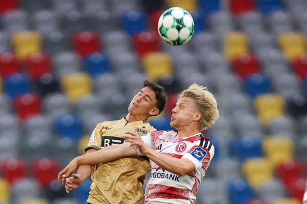 Nicolas Sessa of VfB Stuttgart II and Andreas Mueller of Fortuna Düsseldorf battle for the ball during the 3. Liga match between Fortuna Düsseldorf and VfB Stuttgart II at the Merkur Spiel Arena on August 28, 2026, in Düsseldorf, Germany. Photo by Oliver Kaelke, DeFodi Images. Nicolas Sessa of VfB Stuttgart II and Andreas Mueller of Fortuna Düsseldorf battle for the ball during the 3. Liga match between Fortuna Düsseldorf and VfB Stuttgart II at Merkur Spiel Arena on August 28, 2026 in Düsseldorf, Germany. Photo by Oliver Kaelke, DeFodi Images. DFB and DFL regulations prohibit any use of photographs as image sequences and or quasi-video. Photo by Oliver Kaelke, DeFodi Images