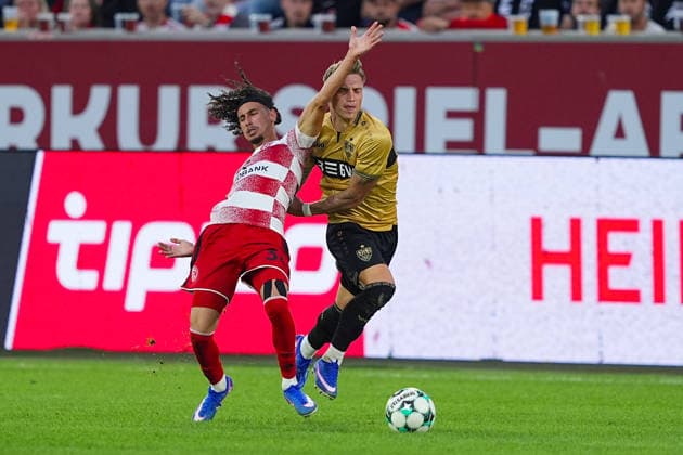 August 28, 2026, xydrx, Soccer, 3rd Division, Fortuna Düsseldorf vs. VfB Stuttgart II, 2026–2027 season, Merkur Spiel Arena: Anas Slimani of Fortuna Düsseldorf, No. 34, in a tackle against Veit Stange of VfB Stuttgart II, No. 31. DFB regulations prohibit any use of photographs as image sequences and or quasi-video Copyright: HMBxMedia YannisxDreimann