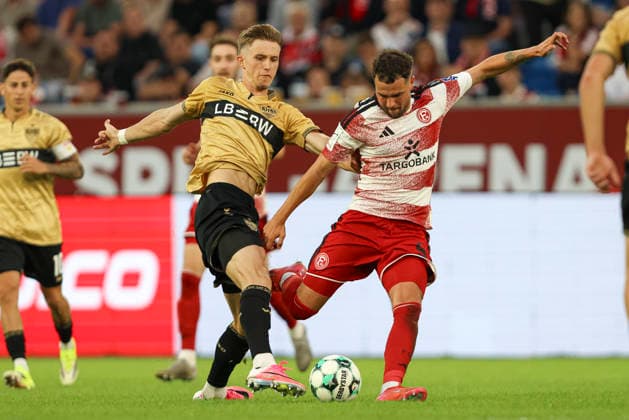 Oliver Roelke of VfB Stuttgart II and Yassine Bouchama of Fortuna Düsseldorf battle for the ball during the 3. Liga match between Fortuna Düsseldorf and VfB Stuttgart II at the Merkur Spiel Arena on August 28, 2026, in Düsseldorf, Germany. Photo by Oliver Kaelke, DeFodi Images. Oliver Roelke of VfB Stuttgart II and Yassine Bouchama of Fortuna Düsseldorf battle for the ball during the 3. Liga match between Fortuna Düsseldorf and VfB Stuttgart II at Merkur Spiel Arena on August 28, 2026 in Düsseldorf, Germany. Photo by Oliver Kaelke, DeFodi Images. DFB and DFL regulations prohibit any use of photographs as image sequences and or quasi-video. Photo by Oliver Kaelke, DeFodi Images.