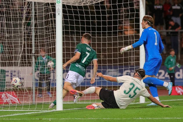 August 28, 2026, Soccer, Men s, 2026–2027 Season, Bavarian Regional League, Matchday 6: FC Schweinfurt 05 vs. SpVgg Greuther Fürth II. From left: Philipp Hack (FC Schweinfurt 05), No. 07 scores the 4–0 goal, Jakob Engel (SpVgg Greuther Fürth II, No. 35), and goalkeeper Theo Menapace (SpVgg Greuther Fürth II, No. 01) at the Schweinfurt Riedel Bau Arena in the Sachs Stadio, Bavaria, Lower Franconia, Germany