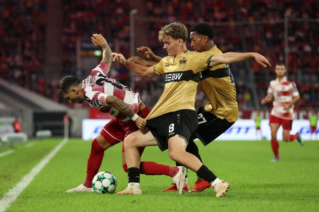 Matthias Zimmermann, Fortuna Düsseldorf, Yanik Spalt of VfB Stuttgart II and Jarzinho Malanga of VfB Stuttgart II battle for the ball during the 3. Liga match between Fortuna Düsseldorf and VfB Stuttgart II at the Merkur Spiel Arena on August 28, 2026, in Düsseldorf, Germany. Photo by Oliver Kaelke, DeFodi Images. Matthias Zimmermann of Fortuna Düsseldorf, Yanik Spalt of VfB Stuttgart II, and Jarzinho Malanga of VfB Stuttgart II battle for the ball during the 3. Liga match between Fortuna Düsseldorf and VfB Stuttgart II at Merkur Spiel Arena on August 28, 2026 in Düsseldorf, Germany. Photo by Oliver Kaelke, DeFodi Images. DFB and DFL regulations prohibit any use of photographs as image sequences and or quasi-video. Photo by Oliver Kaelke, DeFodi Images.