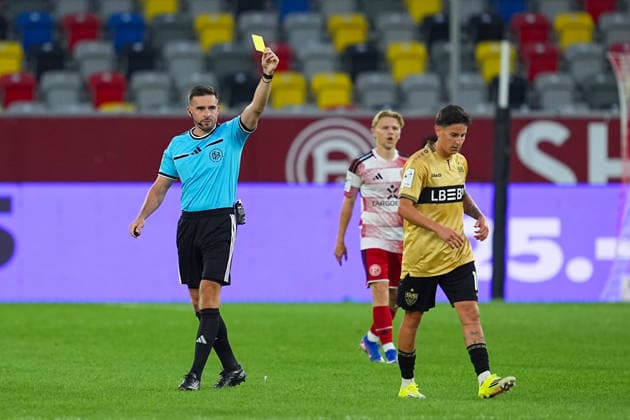August 28, 2026, xydrx, Soccer, 3rd Division, Fortuna Düsseldorf vs. VfB Stuttgart II, 2026–2027 season, Merkur Spiel Arena: Referee Tom Bauer shows Nicolas Sessa of VfB Stuttgart II the yellow card. DFB regulations prohibit any use of photographs as image sequences and or quasi-video. Copyright: HMBxMedia YannisxDreimann