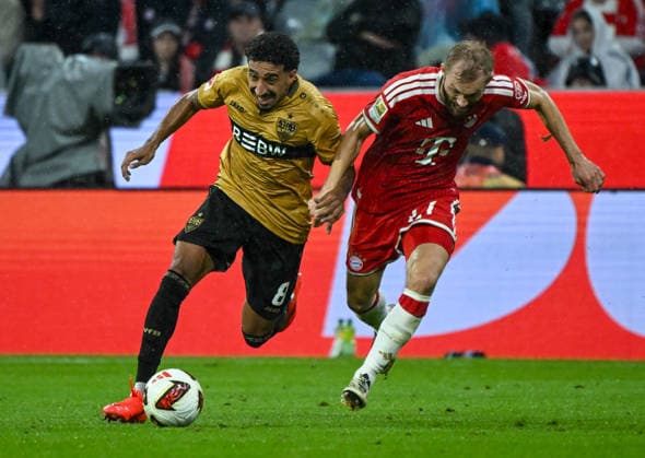 28.08.2026, xemx, Fussball 1.Bundesliga, FC Bayern Muenchen - VfB Stuttgart v.l. Tiago Tomas (VfB Stuttgart), Konrad Laimer (FC Bayern Muenchen) Zweikampf, Aktion, action, battle for the ball (DFL DFB REGULATIONS PROHIBIT ANY USE OF PHOTOGRAPHS as IMAGE SEQUENCES and or QUASI-VIDEO) Muenchen *** August 28, 2026, xemx, Soccer, Bundesliga 1, FC Bayern Munich vs. VfB Stuttgart, Tiago Tomas (VfB Stuttgart), Konrad Laimer, FC Bayern Munich, tackle, action, battle for the ball. DFL and DFB regulations prohibit any use of photographs as image sequences and or quasi-video. Munich