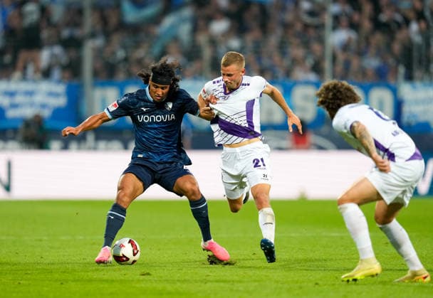 Yigit Karademir (VfL Bochum 1848, 4) im Zweikampf mit Adrian Beck (VfL Osnabrueck, 21) GER, VfL Bochum 1848 vs VfL Osnabrueck, 2. Bundesliga, 3. Spieltag, Saison 2026-27, 28.08.2026 DFL REGULATIONS PROHIBIT ANY USE OF PHOTOGRAPHS AS IMAGE SEQUENCES AND OR QUASI-VIDEO GER, VfL Bochum 1848 vs VfL Osnabrueck, 2. Bundesliga, 3. Spieltag, Saison 2026-27, 28.08.2026 Bochum *** Yigit Karademir (VfL Bochum 1848), No. 4, in a tackle with Adrian Beck (VfL Osnabrück), No. 21 (GER), VfL Bochum 1848 vs. VfL Osnabrück, 2. Bundesliga, Matchday 3, 2026–27 season, August 28, 2026. DFL regulations prohibit any use of photographs as image sequences and or quasi-video. GER, VfL Bochum 1848 vs. VfL Osnabrück, 2. Bundesliga, Matchday 3, 2026–27 season, August 28, 2026, Bochum Copyright: xEibner-Pressefoto ScottxColemanx EP_SCN