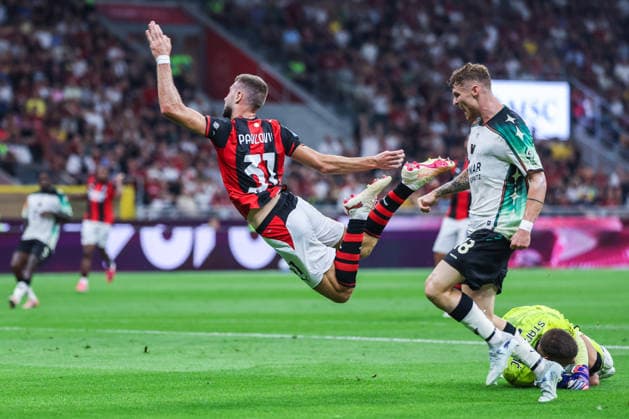 Strahinja Pavlovic of AC Milan seen in action with Filip Stankovic of Venezia FC during Serie A 2026 27 football match between AC Milan and Venezia FC Italy Copyright: xBEAUTIFULxSPORTS Carabellix