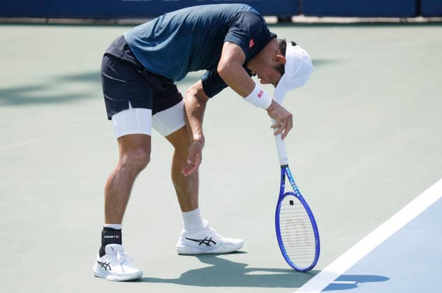 Kei Nishikori of Japan reacts after losing a point to Rei Sakamoto of Japan before his defeat in a qualifying final round match at the 2026 US Open Tennis Championship at the USTA Billie Jean King National Tennis Center in New York City on Friday, August 28, 2026. This was Nishikori s final Grand Slam appearance.  NYP20260828139 JOHNxANGELILLO