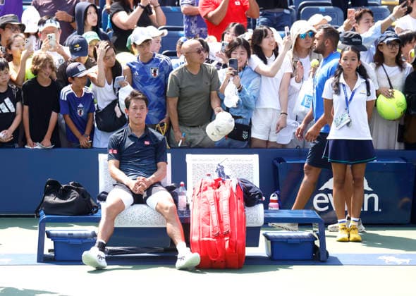 Kei Nishikori of Japan sits after his defeat to Rei Sakamoto of Japan in a qualifying final round match at the 2026 US Open Tennis Championship at the USTA Billie Jean King National Tennis Center in New York City on Friday, August 28, 2026. This was Nishikori s final Grand Slam appearance.  NYP20260828134 JOHNxANGELILLO