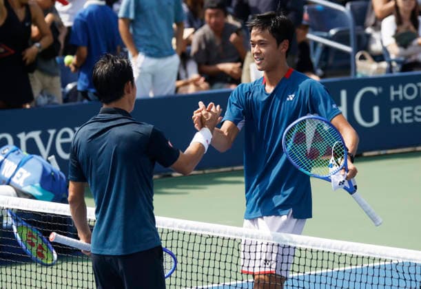 Kei Nishikori of Japan meets Rei Sakamoto of Japan at net after his straight sets defeat in a qualifying final round match at the 2026 US Open Tennis Championship at the USTA Billie Jean King National Tennis Center in New York City on Friday, August 28, 2026. This was Nishikori s final Grand Slam appearance.  NYP20260828136 JOHNxANGELILLO