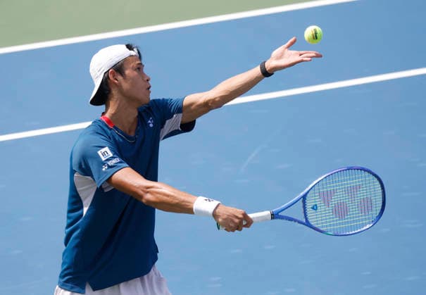 Rei Sakamoto of Japan serves to Kei Nishikori of Japan before defeating Nishikori in a qualifying final round match at the 2026 US Open Tennis Championship at the USTA Billie Jean King National Tennis Center in New York City on Friday, August 28, 2026. This was Nishikori s final Grand Slam appearance.  NYP20260828138 JOHNxANGELILLO