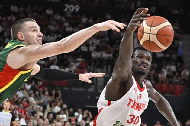 Turkiye v Lithuania - FIBA 2027 World Cup European Qualifiers ISTANBUL, TURKIYE - AUGUST 28: Adem Bona (30) of Turkiye in action against Marek Blazevic (L) of Lithuania during FIBA 2027 World Cup European Qualifiers Group J second round match between Turkiye and Lithuania at Basketball Development Center in Istanbul, Turkiye on August 28, 2026. Muhammed Enes Yildirim Anadolu Istanbul Turkey. Editorial use only. Please get in touch for any other usage.  Copyright: x2026xAnadoluxMuhammedxEnesxYildirimx