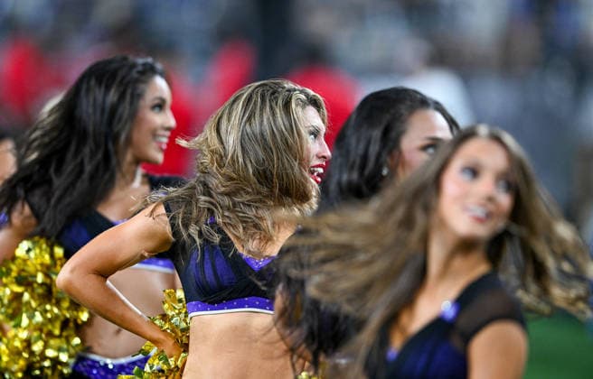 Baltimore Ravens cheerleaders perform against the Washington Commanders during the fourth quarter of a preseason game at M&T Bank Stadium in Baltimore, Maryland, on Friday, August 28, 2026. The Ravens won 41-3.  BAL20260828123 DAVIDxTULIS