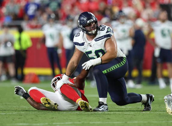 KANSAS CITY, MO - AUGUST 28: Beau Stephens 60 of the Seattle Seahawks blocks a defender to the ground in the third quarter of an NFL, American Football Herren, USA preseason game between the Seattle Seahawks and Kansas City Chiefs on Aug 28, 2026 at Arrowhead Stadium in Kansas City, MO. (Photo by Scott Winters Icon Sportswire) NFL: AUG 28 Seahawks at Chiefs EDITORIAL USE ONLY Icon2608281649
