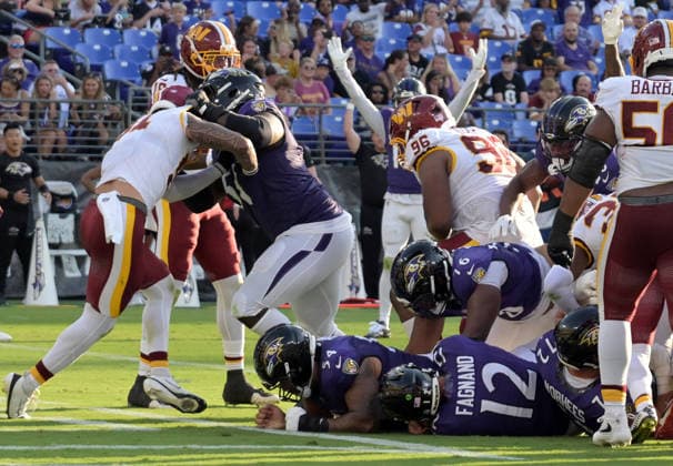 BALTIMORE, MD - AUGUST 28: Baltimore Ravens quarterback Joe Fagnano (12) scores during the preseason NFL, American Football Herren, USA game between the Washington Commanders and the Baltimore Ravens on August 28, 2026, at M&T Bank Stadium in Baltimore, MD. (Photo by Mark Goldman Icon Sportswire) NFL: AUG 28 Commanders at Ravens EDITORIAL USE ONLY Icon74926082809