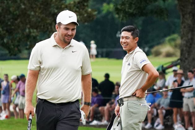 August 28, 2026, Atlanta, Georgia, USA: Collin Morikawa (USA)(R) and Chris Gotterup (USA) share a laugh on the 18th green after the second round of the 2026 TOUR Championship at East Lake Golf Club. Atlanta USA - ZUMAw109 20260828_fap_w109_058 Copyright: xDebbyxWongx