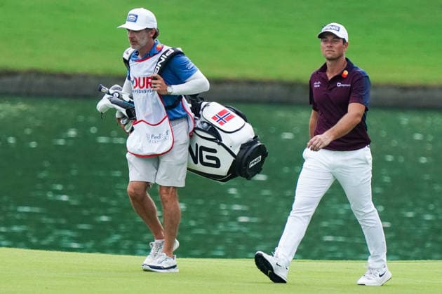 August 28, 2026, Atlanta, Georgia, USA: Viktor Hovland (NOR)(R) and his caddie, Shay Knight approach the 18th green during the second round of the 2026 TOUR Championship at East Lake Golf Club. Atlanta USA - ZUMAw109 20260828_fap_w109_071 Copyright: xDebbyxWongx