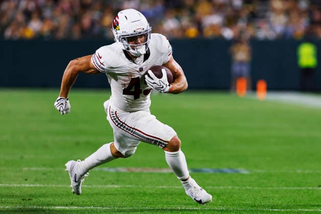 GREEN BAY, WI - AUGUST 28: Arizona Cardinals running back Evan Hull (43) scores a touchdown during a preseason game between the Green Bay Packers and the Arizona Cardinals on August 28, 2026 at Lambeau Field, in Green Bay, WI. (Photo by Larry Radloff Icon Sportswire) NFL, American Football Herren, USA AUG 28 Cardinals at Packers EDITORIAL USE ONLY Icon202608284403