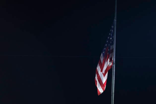 GREEN BAY, WI - AUGUST 28: The United States flag flys at half mast to honor Dolly Parton during a preseason game between the Green Bay Packers and the Arizona Cardinals on August 28, 2026 at Lambeau Field, in Green Bay, WI. (Photo by Larry Radloff Icon Sportswire) NFL, American Football Herren, USA AUG 28 Cardinals at Packers EDITORIAL USE ONLY Icon202608284532