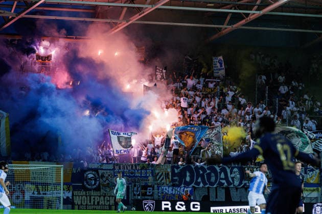 August 28, 2026, GER, Regionalliga Nord Ost, Matchday 3, 2026–2027 Season, Chemnitz, Chemnitzer FC vs. FC Carl Zeiss Jena; FC Carl Zeiss Jena fan section using pyrotechnics at Chemnitz Eins Stadium, An der Gellertstraße, Saxony, Germany Copyright: xnordphotoxGmbHx xTrienitzx