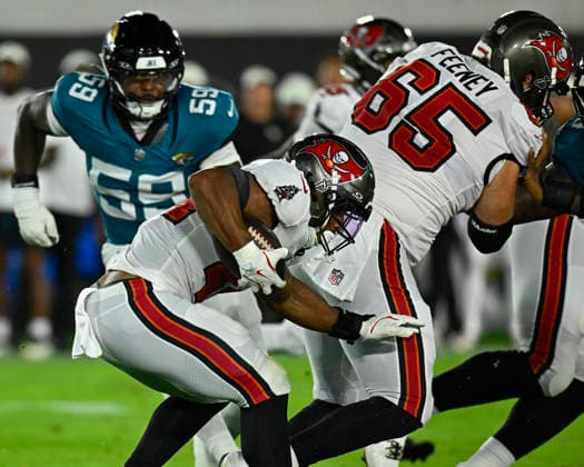 Tampa Bay Running Back Sean Tucker gets stopped at the line of scrimmage as the Buccaneers compete against the Jaguars at EverBank Stadium in Jacksonville, Florida on Friday August 28, 2026. The Jaguars defeated the Bucs 19-0.  JAX20260828011 JOExMARINO
