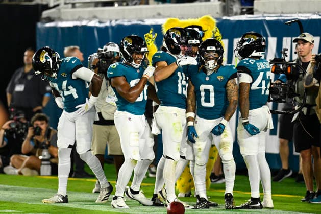 Jacksonville Wide Receiver Michael Wortham (0) celebrates his touchdown with teammates as the Jaguars compete against the Buccaneers at EverBank Stadium in Jacksonville, Florida on Friday August 21, 2026. The Jaguars defeated the Bucs 19-0.  JAX20260828020 JOExMARINO