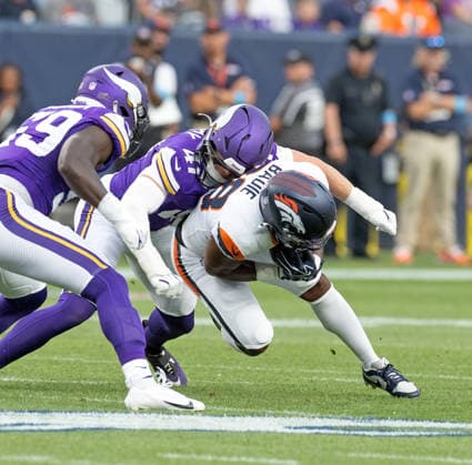 August 28, 2026, Denver, Colorado, USA: Broncos RB TYLER BADIE runs for tough yardage against the Vikings Defense during the 1st. Half at Empower Field at Mile High Friday evening. Broncos beat the Vikings 34-6 in Pre-Season play. Credit Image: ZUMA Press Wire) Denver USA - ZUMAav4_ 20260828_zaf_av4_015 Copyright: xHectorxAcevedox