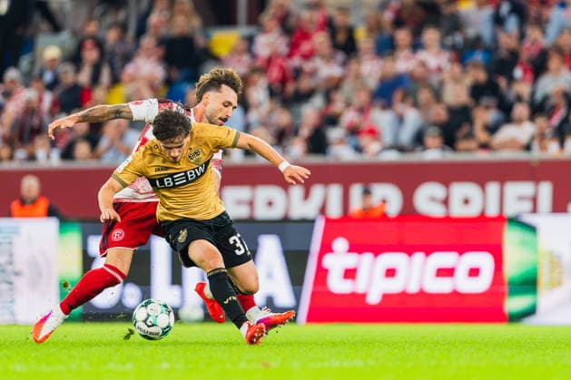 A tackle between Fabian Schleusener of Fortuna Düsseldorf, 24, and David Preu of VFB Stuttgart II, 37, for the ball—Fortuna Düsseldorf vs. VFB Stuttgart II, soccer, 3. Liga, Matchday 3, 2026–27 season, August 28, 2026, DFL regulations prohibit any use of photographs as image sequences and or quasi-video; Fortuna Düsseldorf vs. VFB Stuttgart II, soccer, 3rd League, Matchday 3, 2026–27 season, August 28, 2026, Düsseldorf Copyright: xEibner-Pressefoto LukasxBaldygax EP_LBA
