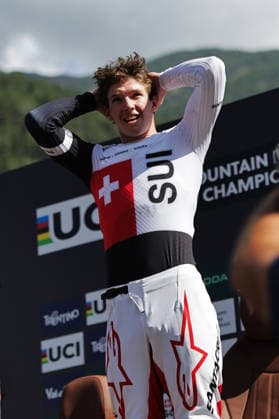 2026 UCI Mountain Bike World Championships Picture by Alex Whitehead SWpix.com - 29 08 2026 - Cycling - 2026 UCI Mountain Bike World Championships - Val di Sole, Trentino, Italy - Downhill (DHI) Final - Men Junior - Raoul Schneeberger (Switzerland) celebrates winning to become World Champion Copyright: x xSWpix.comx(t axPhotographyxHubxLtd)xAlexxWhitehead SWpix.comx SWP-3030-20940