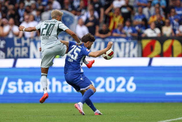 Muhammed Damar (VFL Wolfsburg) und Lilian Egloff (Karlsruher SC) im Zweikampf waehrend des Spiels der 2. Bundesliga zwischen Karlsruher SC und VfL Wolfsburg, BBBank Wildpark am 29. August 2026 in Karlsruhe, Deutschland. (Foto von Oliver Kaelke DeFodi Images) +++ Muhammed Damar (VFL Wolfsburg) und Lilian Egloff (Karlsruher SC) battle for the ball during the 2nd Bundesliga match between Karlsruher SC and VfL Wolfsburg at BBBank Wildpark on August 29, 2026 in Karlsruhe, Germany. (Photo by Oliver Kaelke DeFodi Images) DFB DFL REGULATIONS PROHIBIT ANY USE OF PHOTOGRAPHS AS IMAGE SEQUENCES AND OR QUASI-VIDEO. (Photo by Oliver Kaelke DeFodi Images) - *** Muhammed Damar of VFL Wolfsburg and Lilian Egloff of Karlsruher SC battle for the ball during the 2. Bundesliga match between Karlsruher SC and VfL Wolfsburg at BBBank Wildpark on August 29, 2026, in Karlsruhe, Germany Photo by Oliver Kaelke, DeFodi Images Muhammed Damar of VFL Wolfsburg and Lilian Egloff of Karlsruher SC battle for the ball during the 2nd Bundesliga match between Karlsruher SC and VfL Wolfsburg at BBBank Wildpark on August 29, 2026 in Karlsruhe, Germany. Photo by Oliver Kaelke, DeFodi Images. DFB and DFL regulations prohibit any use of photographs as image sequences and or quasi-video. Photo by Oliver Kaelke, DeFodi Images.