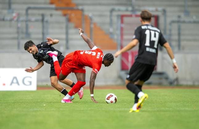 SOCCER REGIONAL LEAGUE NORTHEAST 2026–2027 SEASON, MATCHDAY 7: FC ROT WEISS ERFURT vs. BFC PREUSSEN ** FOR EDITORIAL PURPOSES ONLY ** EDITORIAL USE ONLY ** p August 29, 2026 Erfurt Soccer Regional League Northeast Matchday 7, 2026–2027 Season, Steigerwaldstadion: FC Rot-Weiss Erfurt vs. BFC Preussen. Pictured: Maxime Aglago Awoudja 6 of FC Rot-Weiss Erfurt in a tackle with Joscha Wosz 20 BFC Preussen Germany Thuringia Erfurt Copyright SaschaxFromm Copyright: SaschaxFromm doc87dbmae62k0qvlzu9j2 ,EDITORIAL USE ONLY Copyright: SaschaxFromm