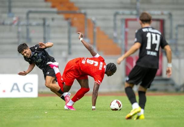 SOCCER REGIONAL LEAGUE NORTHEAST 2026–2027 SEASON, MATCHDAY 7: FC ROT WEISS ERFURT vs. BFC PREUSSEN ** FOR EDITORIAL PURPOSES ONLY ** EDITORIAL USE ONLY ** p August 29, 2026 Erfurt Soccer Regional League Northeast Matchday 7, 2026–2027 Season, Steigerwaldstadion: FC Rot-Weiss Erfurt vs. BFC Preussen. Pictured: Maxime Aglago Awoudja 6 of FC Rot-Weiss Erfurt in a tackle with Joscha Wosz 20 BFC Preussen Germany Thuringia Erfurt Copyright SaschaxFromm Copyright: SaschaxFromm doc87dbman6nno56rh7fcc ,EDITORIAL USE ONLY Copyright: SaschaxFromm