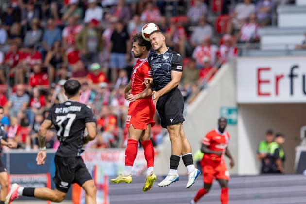 Regionalliga Nordost: FC Rot Weiß Erfurt vs. BFC Preussen Erfurt, August 29, 2026; Romarjo Hajrulla (9) for FC Rot Weiß Erfurt vs. Nino Lessel (4) for BFC Preussen; Regionalliga Nordost: FC Rot Weiß Erfurt vs. BFC Preussen at Steigerwaldstadion, Erfurt 2August 29, 2026 Copyright: xBEAUTIFULxSPORTS Duehringx