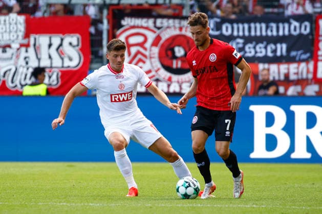 August 29, 2026, xavx, Soccer 3rd Division, SV Wehen Wiesbaden vs. Rot-Weiss Essen; Semir Telalovic (Rot-Weiss Essen), Lukas Schleimer (SV Wehen Wiesbaden), Wiesbaden