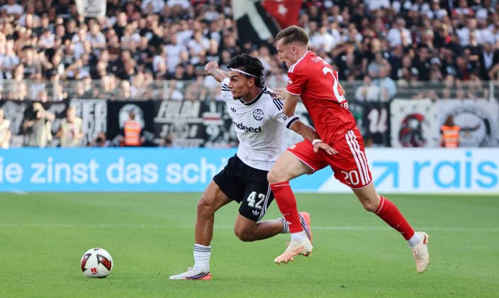 Can Uzun am Ball, Michel Aebischer Zweikampf Spielszene Aktion Fußball Fussball Bundesliga Herren DFL 1. Spieltag Saison 2026 2027 29.08.2026 1.FC Union Berlin FCU vs SG Eintracht Frankfurt SGE DFL regulations prohibit any use of photographs as image sequences and or quasi-video. *** Can Uzun with the ball, Michel Aebischer, tackle, game scene, action, sports, soccer, Bundesliga, men’s, DFL, Matchday 1, 2026–2027 season, August 29, 2026, 1. FC Union Berlin (FCU) vs. SG Eintracht Frankfurt (SGE). DFL regulations prohibit any use of photographs as image sequences and or quasi- video