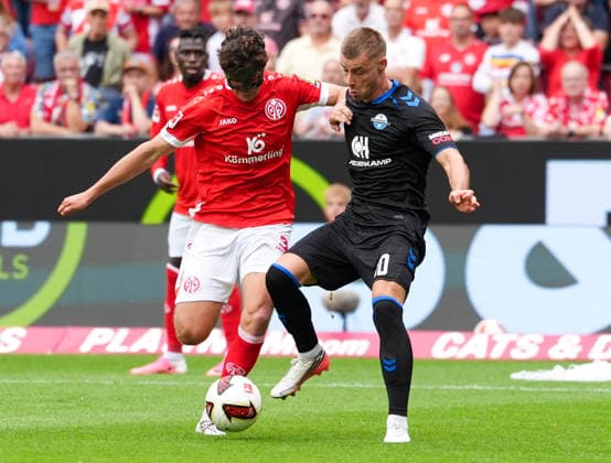 Fabio Gruber (1. FSV Mainz 05, 3) im Zweikampf mit Gabriel Vidovic (SC Paderborn 07, 40). GER, 1. FSV Mainz 05 vs SC Paderborn 07, 1. Bundesliga, 1. Spieltag, Saison 2026-27, MEWA-Arena, Mainz, 29.08.2026 DFL REGULATIONS PROHIBIT ANY USE OF PHOTOGRAPHS AS IMAGE SEQUENCES AND OR QUASI-VIDEO GER, 1. FSV Mainz 05 vs SC Paderborn 07, 1. Bundesliga, 1. Spieltag, Saison 2026-27, 29.08.2026 Mainz *** Fabio Gruber 1 FSV Mainz 05, 3 in a tackle with Gabriel Vidovic SC Paderborn 07, 40 GER, 1 FSV Mainz 05 vs. SC Paderborn 07, 1 Bundesliga, Matchday 1, 2026–27 season, MEWA Arena, Mainz, August 29, 2026 DFL regulations prohibit any use of photographs as image sequences and or quasi-video GER, 1 FSV Mainz 05 vs. SC Paderborn 07, 1 Bundesliga, Matchday 1, 2026–27 Season, August 29, 2026, Mainz Copyright: xEibner-Pressefoto ScottxColemanx EP_SCN