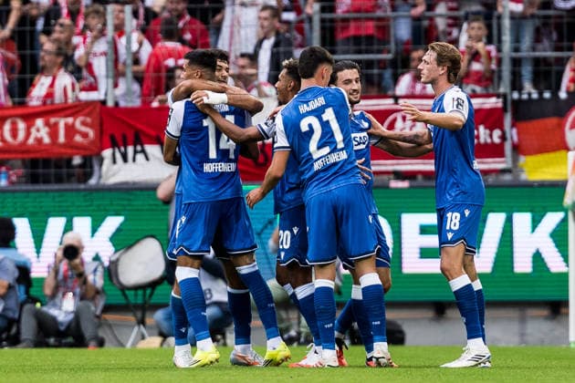 KOELN, GERMANY - AUGUST 29: Adam Daghim (TSG 1899 Hoffenheim, 14) celebrates scoring the 0:1 goal with his teammates during the Bundesliga match between 1. FC Koeln vs. TSG 1899 Hoffenheim at Rheinenergie-Stadion on matchday 1 of the 1. Bundesliga on August 29, 2026 in Koeln, Germany. DFL REGULATIONS PROHIBIT ANY USE OF PHOTOGRAPHS AS IMAGE SEQUENCES AND OR QUASI-VIDEO. North Rhine Westphalia Germany Copyright: xSteffiexWunderlx