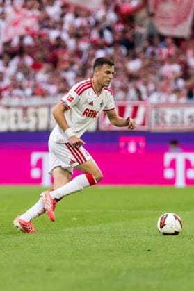 KOELN, GERMANY - AUGUST 29: Paul Okon-Engstler (1. FC Koeln, 23) controls the ball during the Bundesliga match between 1. FC Koeln vs. TSG 1899 Hoffenheim at Rheinenergie-Stadion on matchday 1 of the 1. Bundesliga on August 29, 2026 in Koeln, Germany. DFL REGULATIONS PROHIBIT ANY USE OF PHOTOGRAPHS AS IMAGE SEQUENCES AND OR QUASI-VIDEO. North Rhine Westphalia Germany Copyright: xSteffiexWunderlx