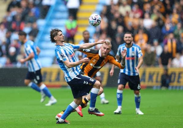 Jack Rudoni of Coventry City and Oliver McBurnie of Hull City Coventry City v Hull City, Premier League Football, Football, Coventry Building Society Arena, Coventry, UK - 29 Aug 2026Coventry Coventry Building Society Arena United Kingdom EDITORIAL USE ONLY No use with unauthorised audio, video, data, fixture lists, club league logos or live services. Online in-match use limited to 120 images, no video emulation. No use in betting, games or single club league player publications. Copyright: xAndrewxFosker Shutterstockx 17119018ct