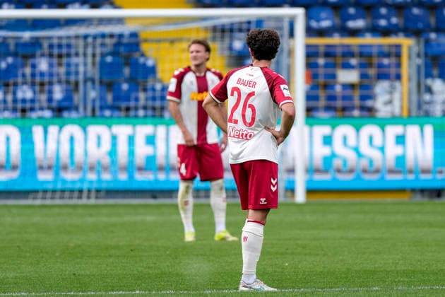 From left: Felix Strauss Strauß, Regensburg, 4, Benedikt Bauer, Regensburg, 26, player for SSV Jahn Regensburg, looking disappointed, disappointment, frustration, pessimistic, after conceding the goal that made the score 2–0, action, game scene, August 29, 2026, Sinsheim, Germany, soccer, 3rd Division, TSG 1899 Hoffenheim II vs. SSV Jahn Regensburg, DFB and DFL regulations prohibit any use of photographs as image sequences and or quasi-video xozx