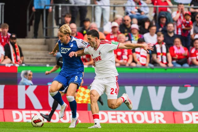 Zweikampf von Max Moerstedt (TSG Hoffenheim, 09) und Luka Lochoshvili (1.FC Koeln, 24) 1.FC Köln vs. TSG Hoffenheim, Fussball, Bundesliga, 1.Spieltag, Saison 2026 27, 29.08.2026, DFL REGULATIONS PROHIBIT ANY USE OF PHOTOGRAPHS AS IMAGE SEQUENCES AND OR QUASI-VIDEO, 1.FC Köln vs. TSG Hoffenheim, Fussball, Bundesliga, 1.Spieltag, Saison 2026 27, 29.08.2026 Köln *** A tackle between Max Moerstedt (TSG Hoffenheim, No. 09) and Luka Lochoshvili (1. FC Köln, No. 24) during the match between 1. FC Köln and TSG Hoffenheim, soccer, Bundesliga, Matchday 1, 2026–27 Season, August 29, 2026, DFL regulations prohibit any use of photographs as image sequences and or quasi-video. 1. FC Köln vs. TSG Hoffenheim, soccer, Bundesliga, Matchday 1, 2026–27 Season, August 29, 2026, Cologne Copyright: xEibner-Pressefoto LukasxBaldygax EP_LBA