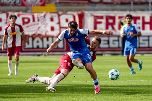 From left: Erik Majetschak (Regensburg), 13; Florian Micheler (TSG II), 28; tackle, game scene, duel, tackle, tackling, dynamic, action, 08 29 2026, Sinsheim, Germany, soccer, 3rd League, TSG 1899 Hoffenheim II vs. SSV Jahn Regensburg, DFB and DFL regulations prohibit any use of photographs as image sequences and or quasi-video xozx