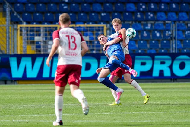From left: Erik Majetschak (Regensburg), 13; Jakov Dedic (TSG II), 36; Leopold Wurm (Regensburg), 37; tackle, game scene, duel, tackle, tackling, dynamism, action, August 29, 2026, Sinsheim, Germany, soccer, 3rd Division, TSG 1899 Hoffenheim II vs. SSV Jahn Regensburg, DFB and DFL regulations prohibit any use of photographs as image sequences and or quasi-video xozx