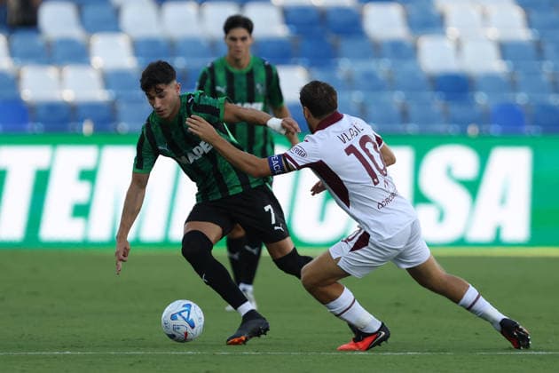 Sassuolo s Cristian Volpato fights for the ball with Torino™s Nikola Vlasic during the Serie A soccer match between Sassuolo and Torino at the Mapei Stadium in Reggio Emilia, north east Italy - August 29, 2026. - Soccer  Copyright: xGiannixSantandrea LaPressex