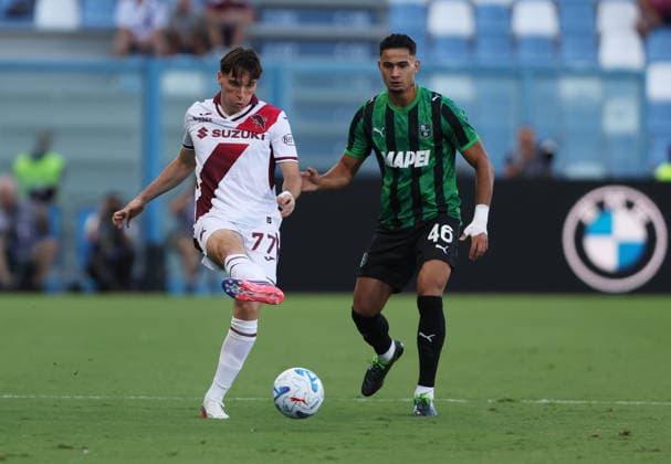 Torino™s Alessio Cacciamani fights for the ball with Sassuolo™s Simone Cinquegrano during the Serie A soccer match between Sassuolo and Torino at the Mapei Stadium in Reggio Emilia, north east Italy - August 29, 2026. - Soccer  Copyright: xGiannixSantandrea LaPressex