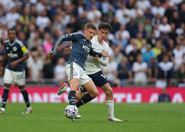29th August 2026; Tottenham Hotspur Stadium, London, England; Premier League Football, Tottenham Hotspur versus Newcastle United; Harvey Barnes of Newcastle United under pressure from Archie Gray of Tottenham Hotspur JohnxPatrickxFletcher