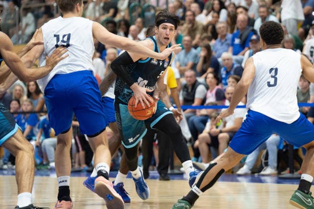 August 29, 2026, xhfmx, Basketball Exhibition Game, Frankfurt Skyliners vs. MLP Academics Heidelberg, featuring Lorenz Brenneke (MLP Academics Heidelberg) and Kevin McClain (MLP Academics Heidelberg) defending against Ryan Acridacano (Frankfurt Skyliners) in Frankfurt